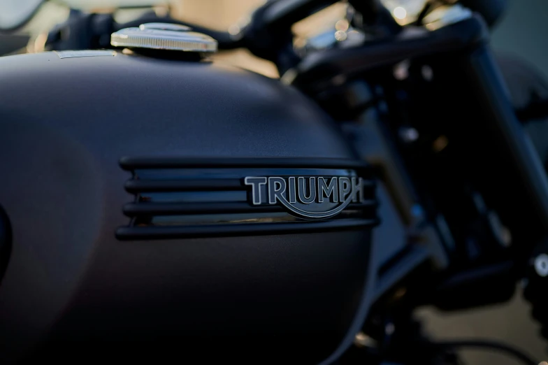 a close up s of a triumph motorcycle's engine