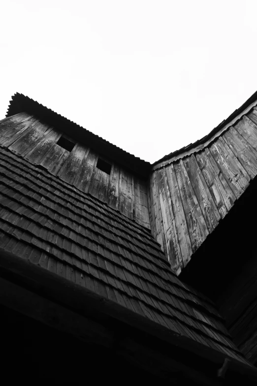 a black and white image of an old building