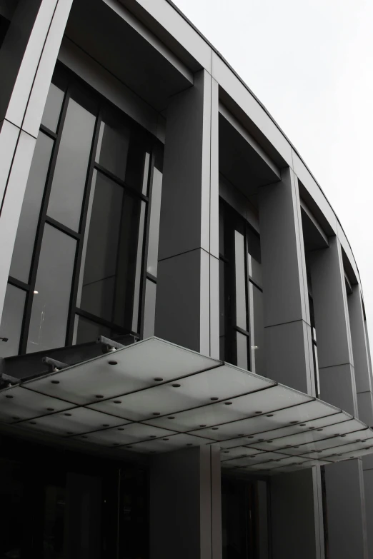 an abstract image of some modern glass and steel buildings