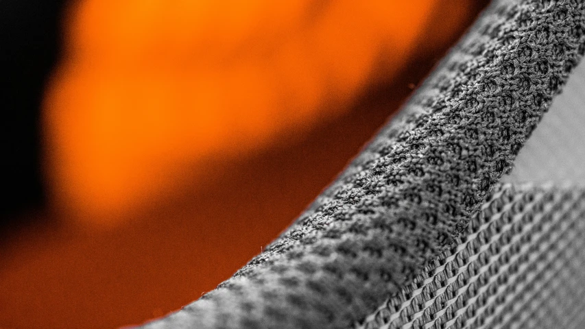 an orange piece of cloth with blurry colors