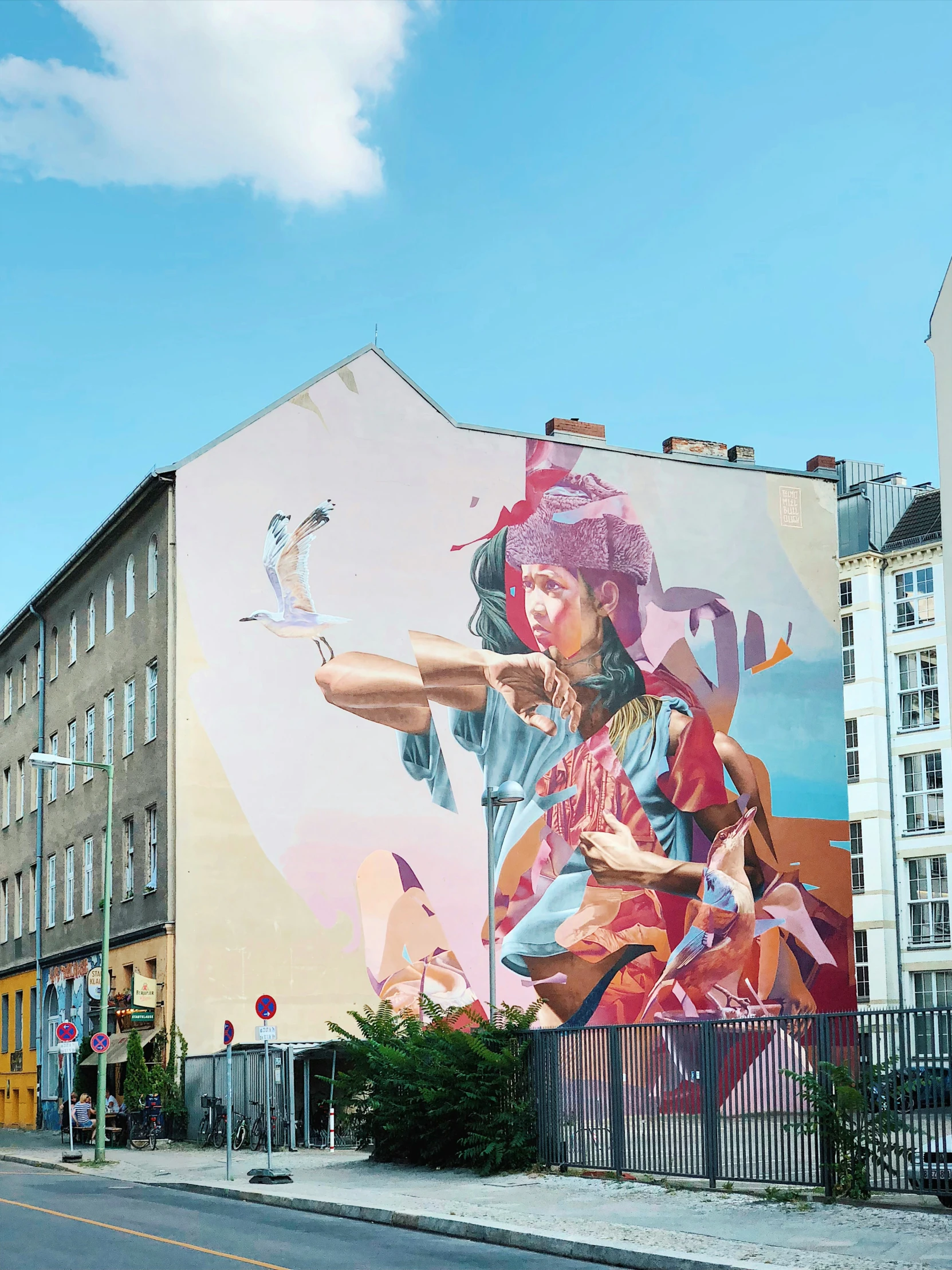 a colorful mural on the side of a building