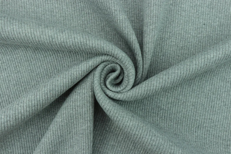 a textured fabric is being used as a backdrop