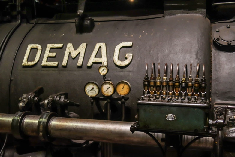 a close - up of a gas tank with the words demmag on it