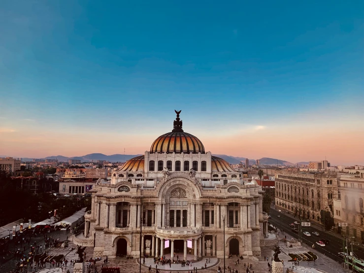 a building with a dome with a sky background