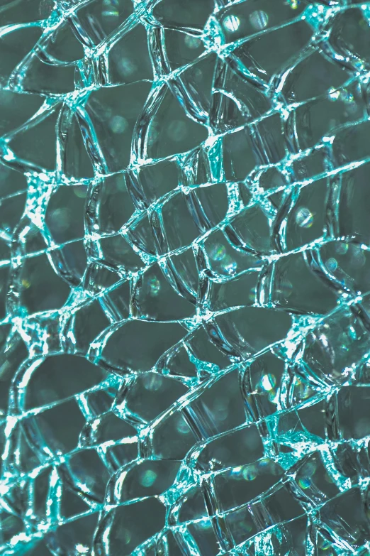 a broken glass screen sitting on top of a table