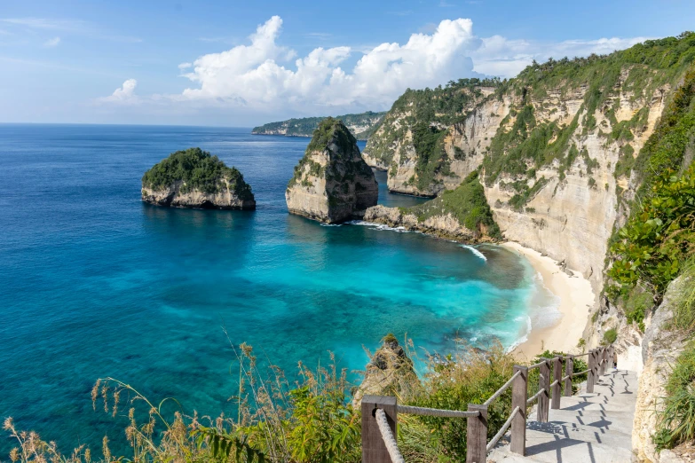 stairs lead down to the beach below