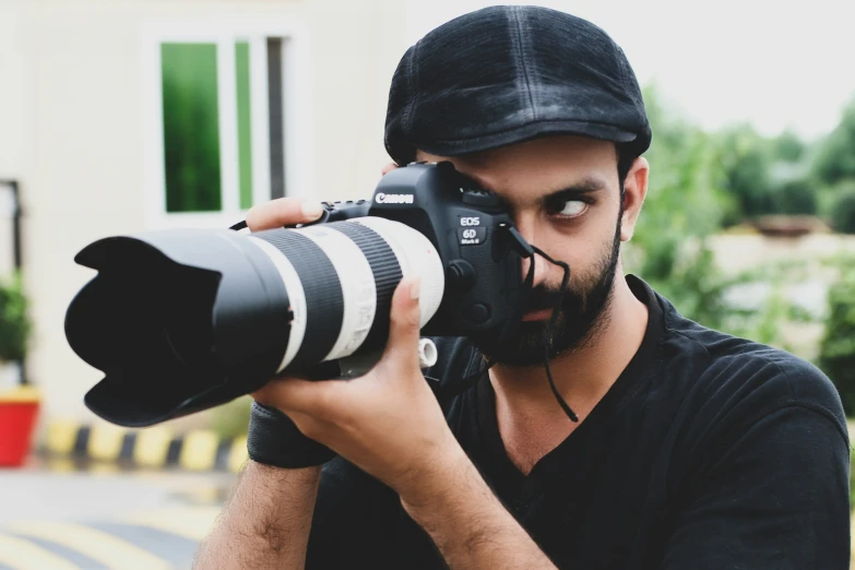 a pographer taking a pograph of himself with his camera