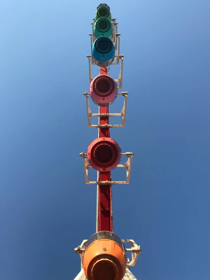 the traffic signal is red and yellow with an open top