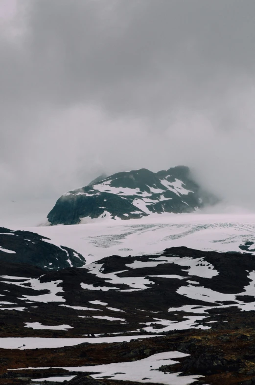 there is a snow covered mountain in the back ground