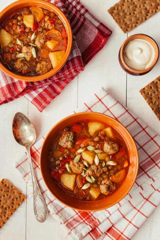 an overhead view of a bowl of soup