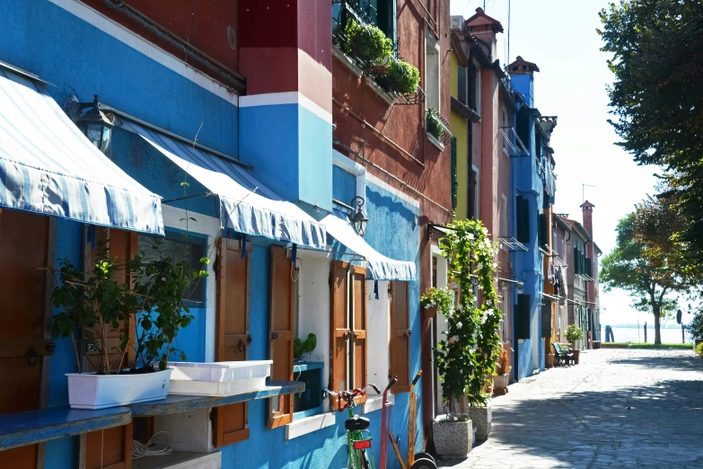 a row of building along a side walk