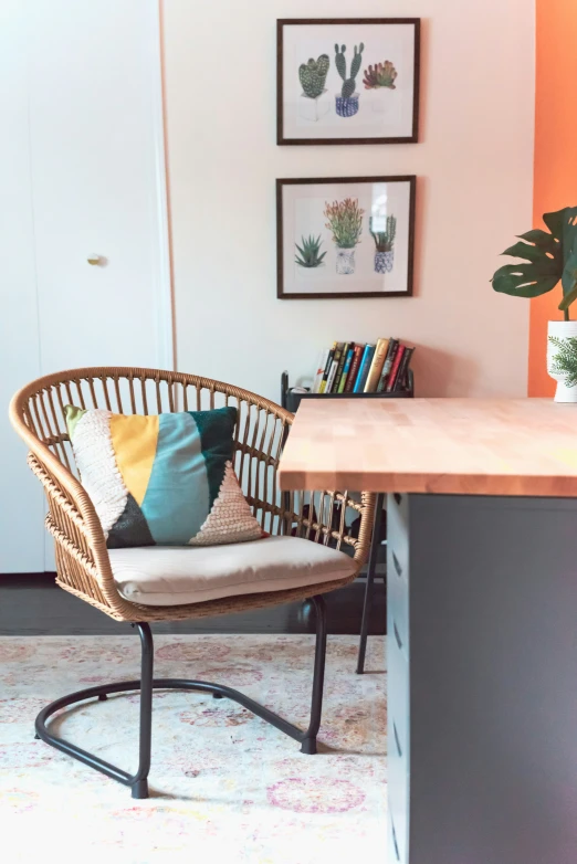 a chair sits by a desk in an apartment