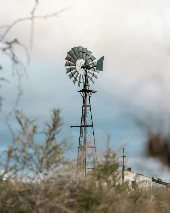 a windmill that has been placed in the ground