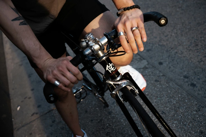 man on bicycle preparing to ride on road