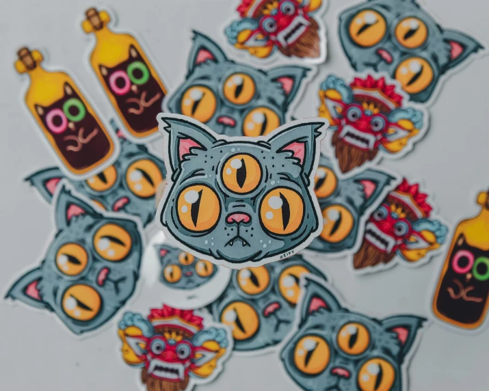 an assortment of stickers with cats in them