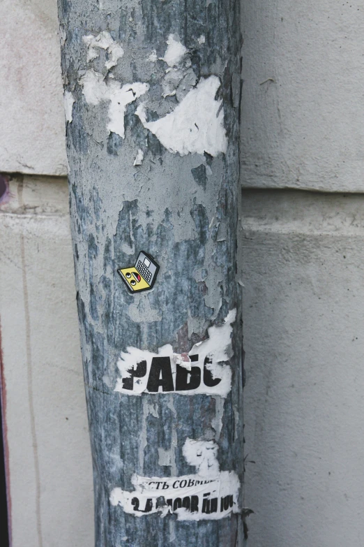 sticker on a sticker attached to a pole