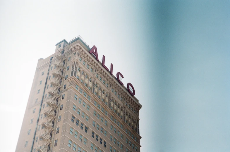 a building with the words atlas written in red on top