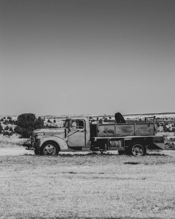 a large truck in the middle of the desert