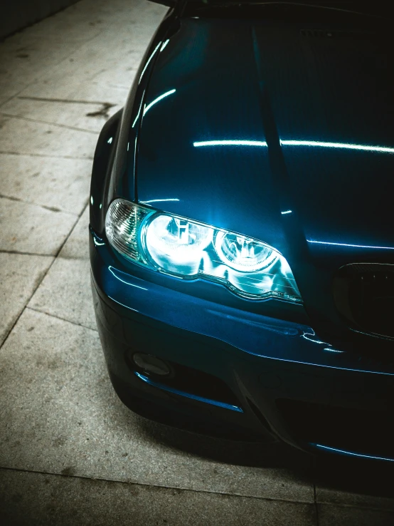 an image of closeup of a dark colored car