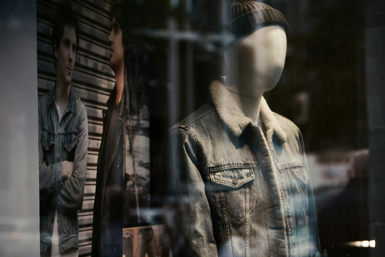 a mannequin is standing outside of a window