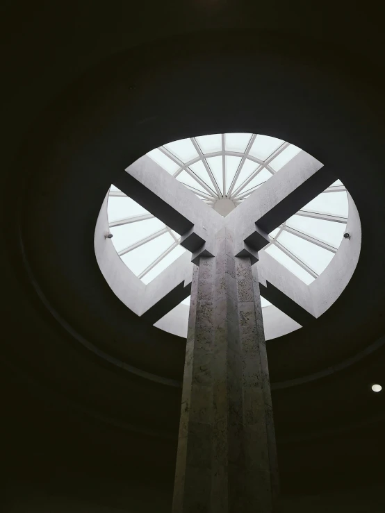 looking up at the inside of a large circular light fixture