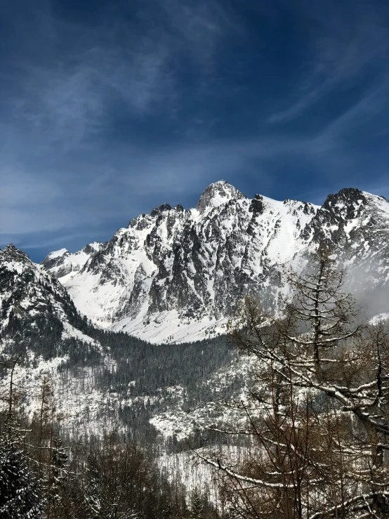 a snow covered mountain covered in snow