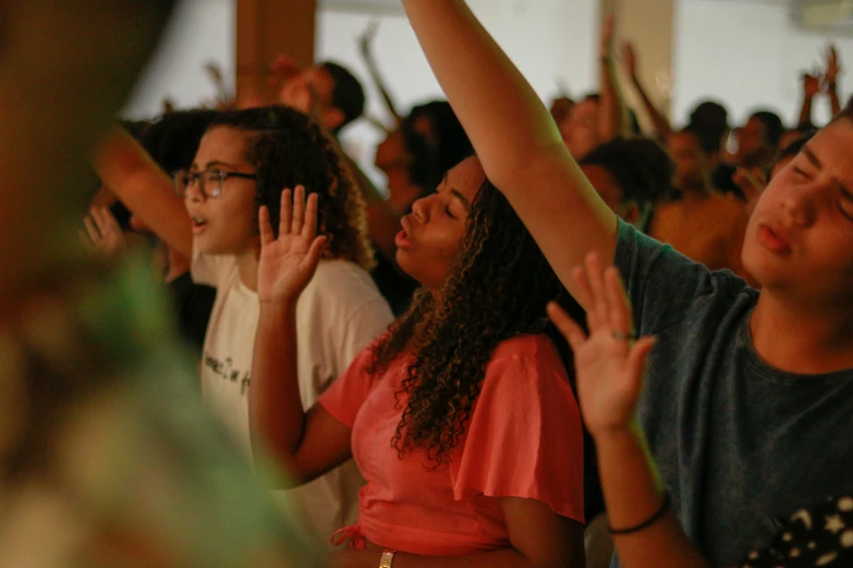 a bunch of people that are clapping together