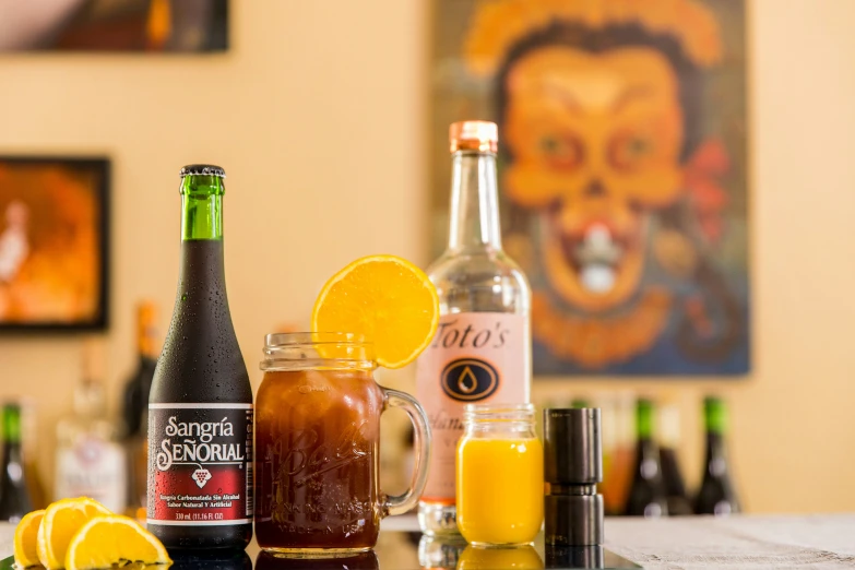 a counter with an assortment of liquors on it