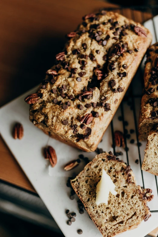 a few slices of loaf of bread with a bite taken out