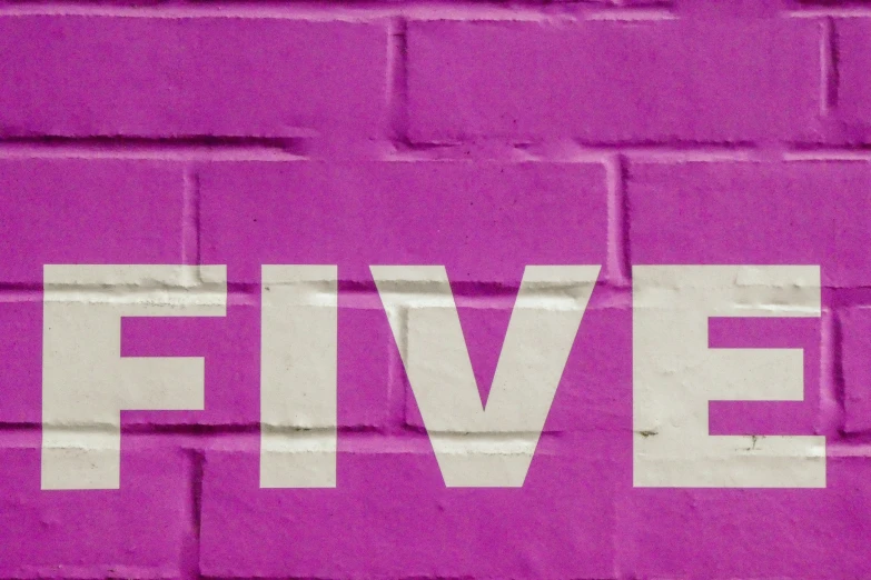 a picture of the words five painted on brick