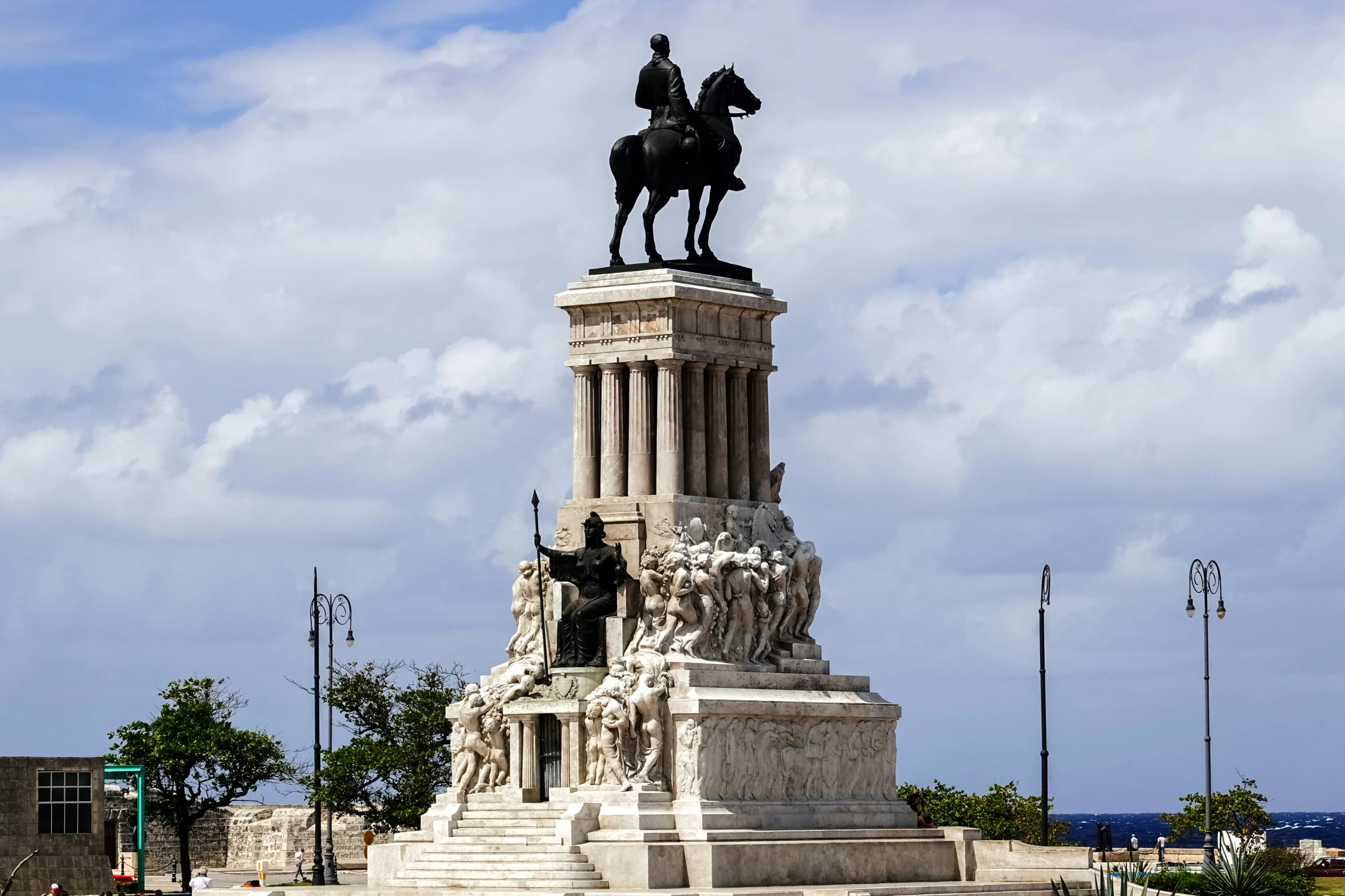 a large statue has an officer riding on it