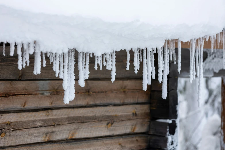 an icicles that are hanging on a house