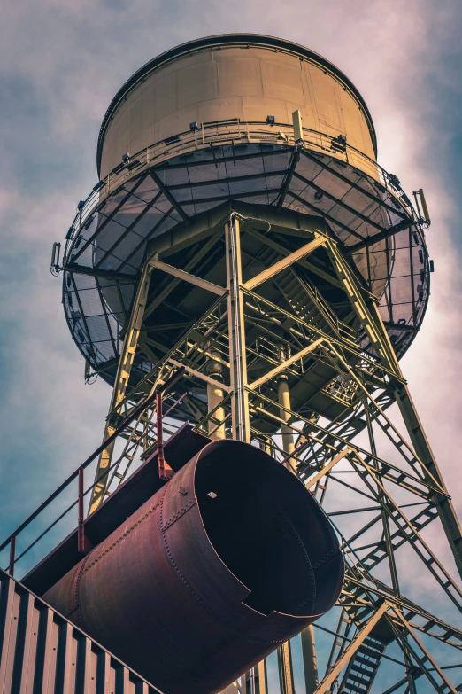 a large metal object sitting on top of a pole