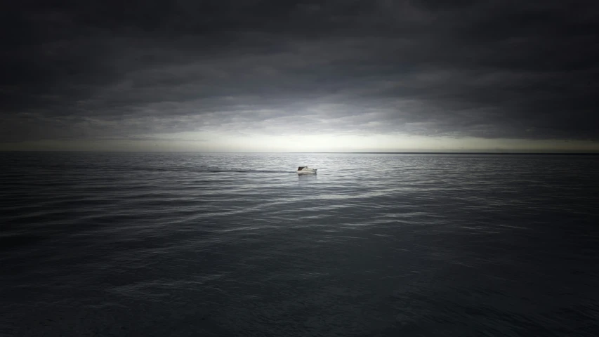 the man on the boat is under a dark sky