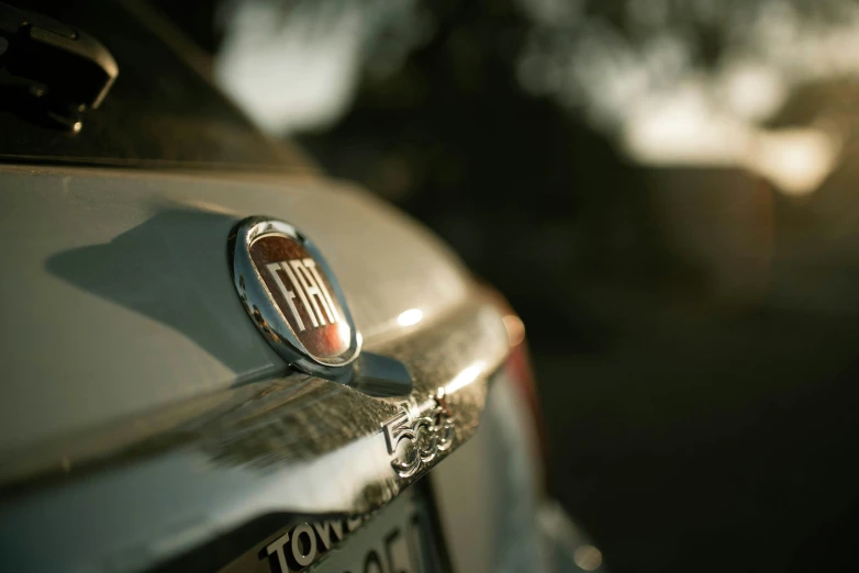 closeup po of front bumper sticker and emblem