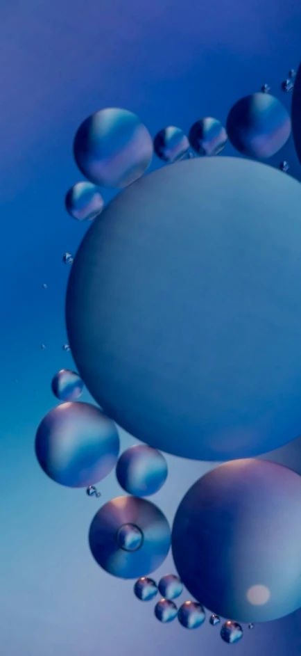 abstract art design featuring many shiny blue balloons