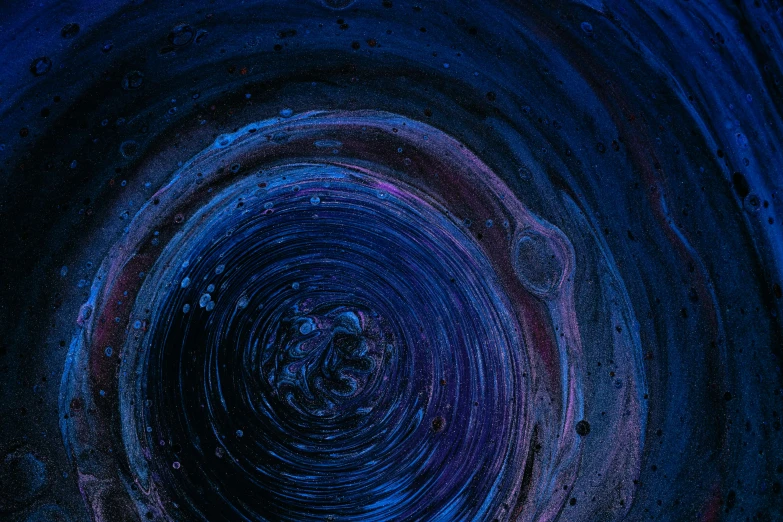 an image of a circle with blue and purple paint