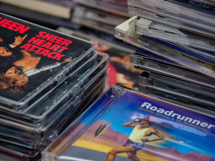 a large stack of cassettes stacked next to each other