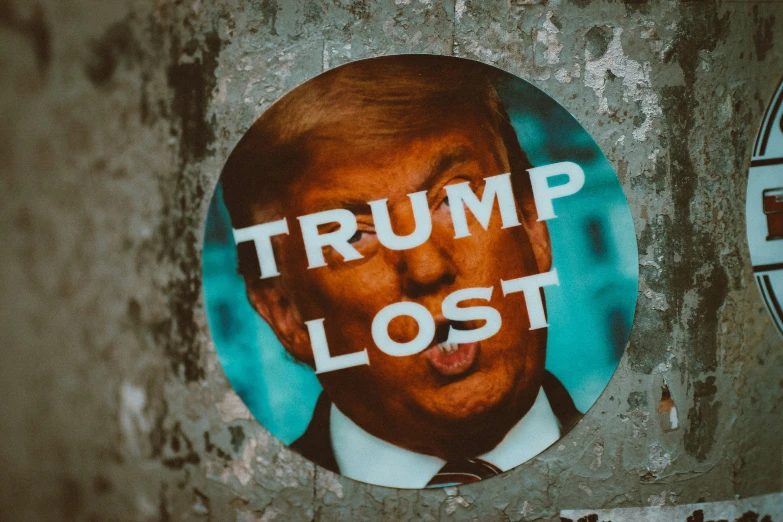 trump lost sticker on concrete and wall with slogan