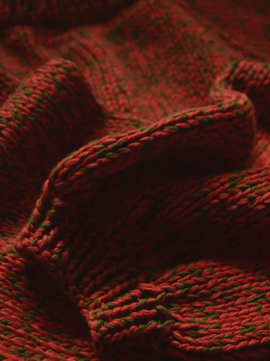 a blanket with a red pattern that is very soft