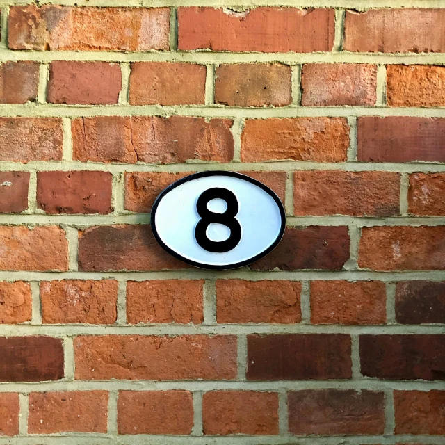 there is a house number 8 painted on the wall