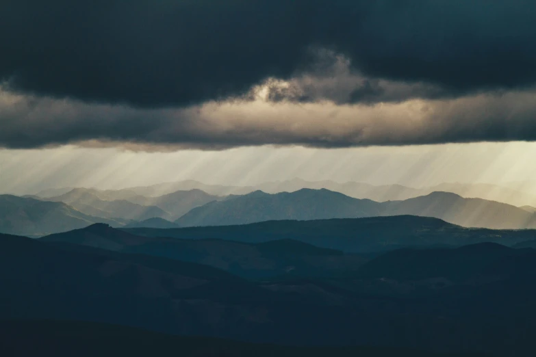 the sky over the mountains has a very large amount of light