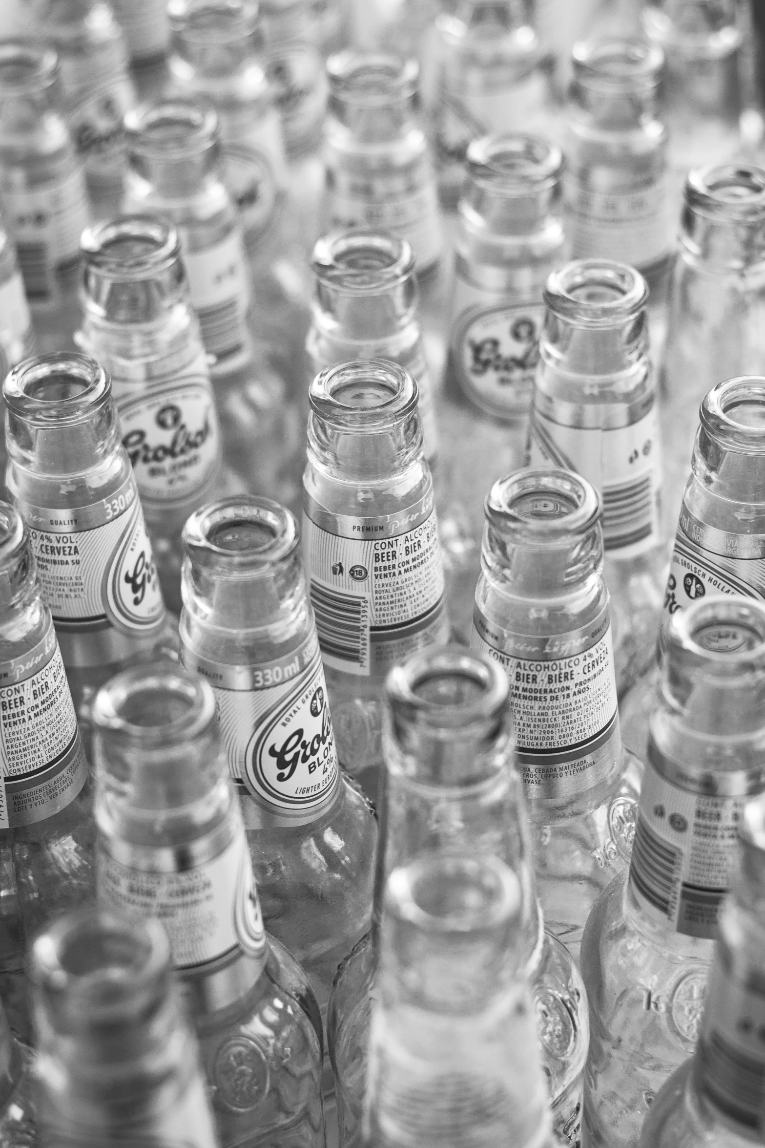 a group of plastic bottles sitting on top of a counter