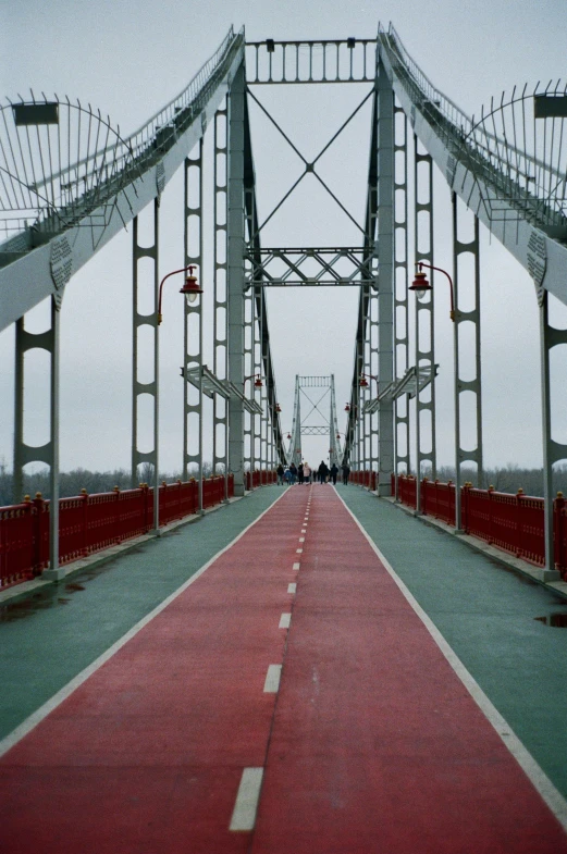 a very big bridge with some lights above it