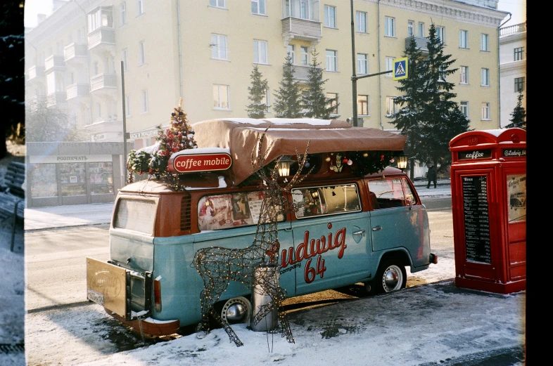 a christmas truck with a christmas tree on top