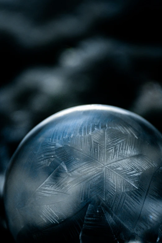 an aluminum object with some snowflaken designs on it