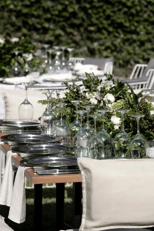 a table with flowers and candles on it