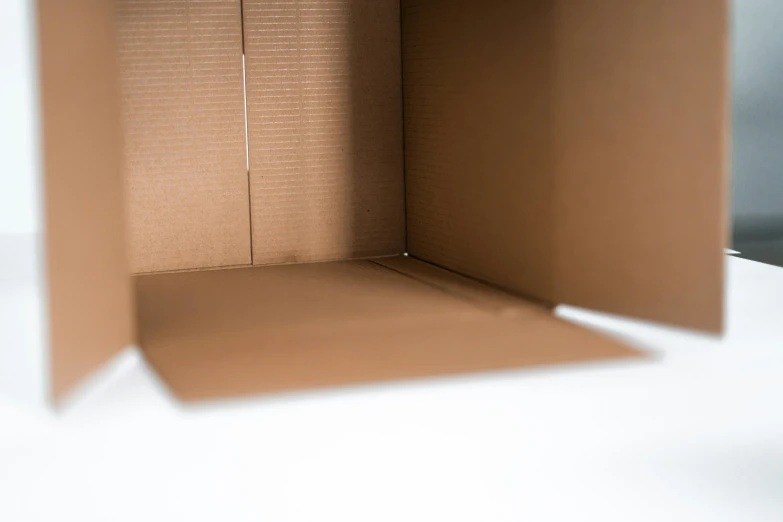 an open cardboard box on a table