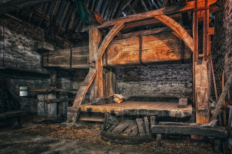 an old wooden bed inside of a room