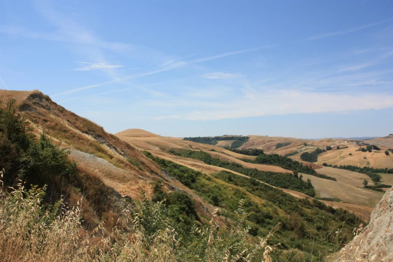 a mountain scene with a hill in the background